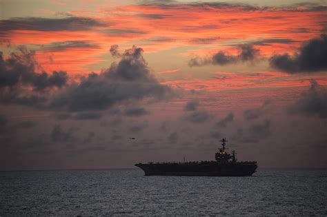 USS Stennis at sunset