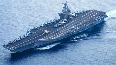 Aircraft taking off from USS Theodore Roosevelt