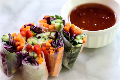 Veggie spring rolls with peanut sauce and pickled carrots