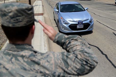 A soldier performing a vehicle salute