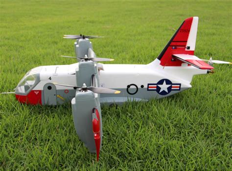 A pilot holding a vertical takeoff RC plane