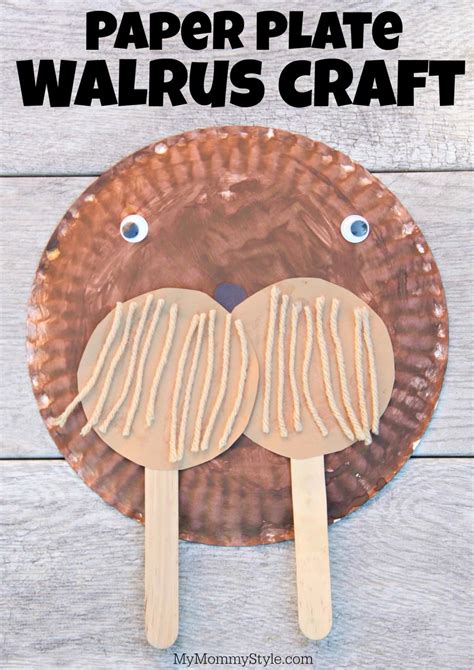 A paper plate walrus craft with construction paper tusks and flippers