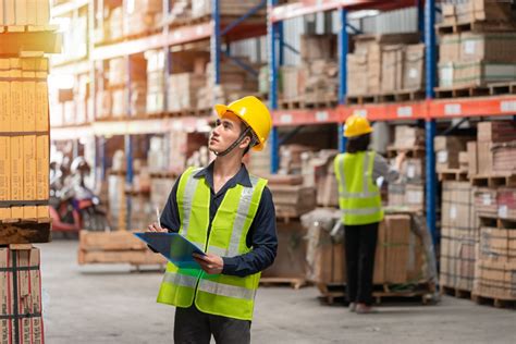 Warehouse workers performing various tasks