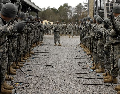 A soldier shaking hands with a civilian employer