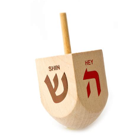 A traditional dreidel with Hebrew letters