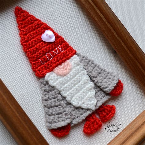 A whimsical gnome applique pattern on a sewing machine