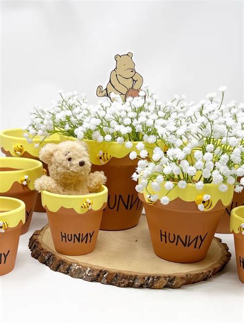 Winnie the Pooh party ideas, including decorations, games, and food ideas