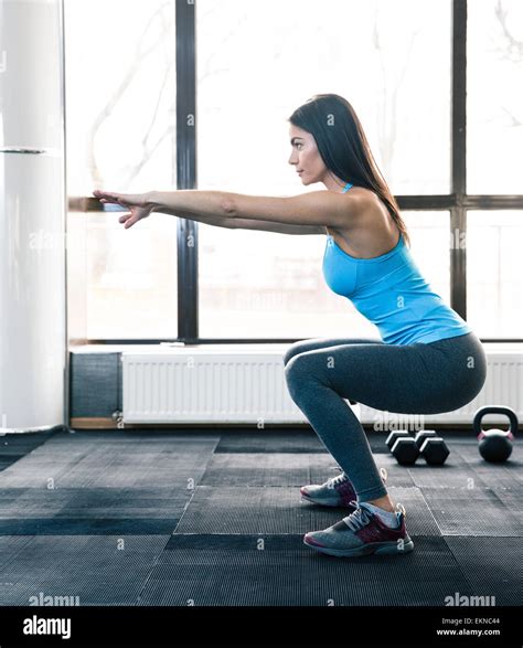 Woman doing squats with proper form