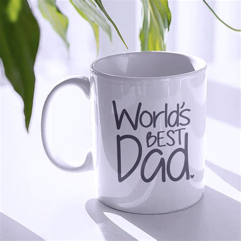 A personalized mug with a Worlds Best Dad design