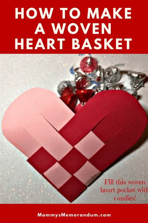 A close-up of a person's hands weaving a heart basket