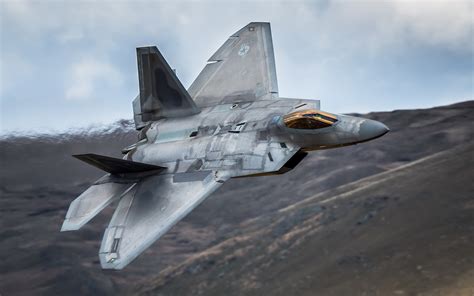 YF-22 Raptor taking off from a runway